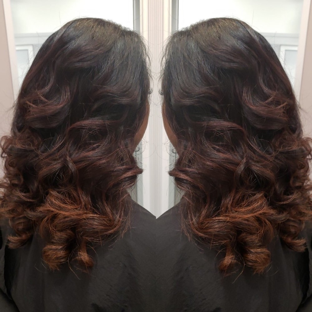 Silk press with glossy, straight natural hair at SheBeenHair