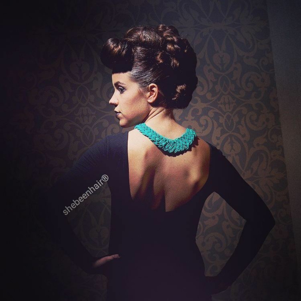 Event updo with polished finish at SheBeenHair salon
