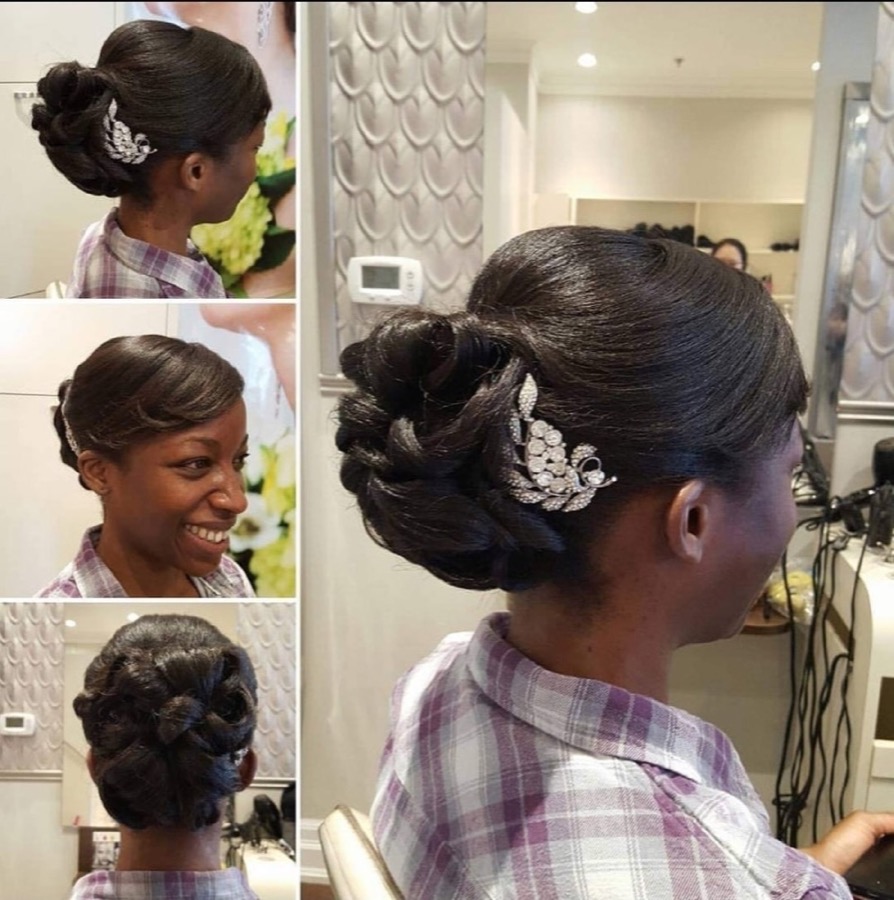 Bridal updo with elegant curls and gold accessories at SheBeenHair